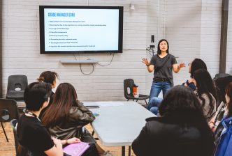 Learning about stage management with Natalie Wong during backstage training week. Credit: Andrew Billington